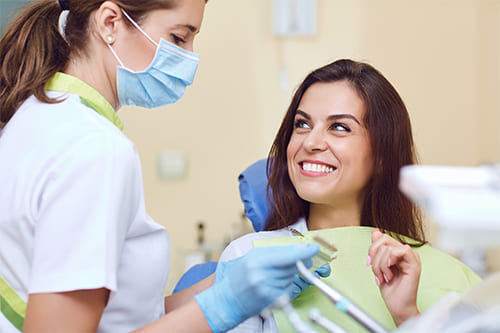 woman consulting with dentist